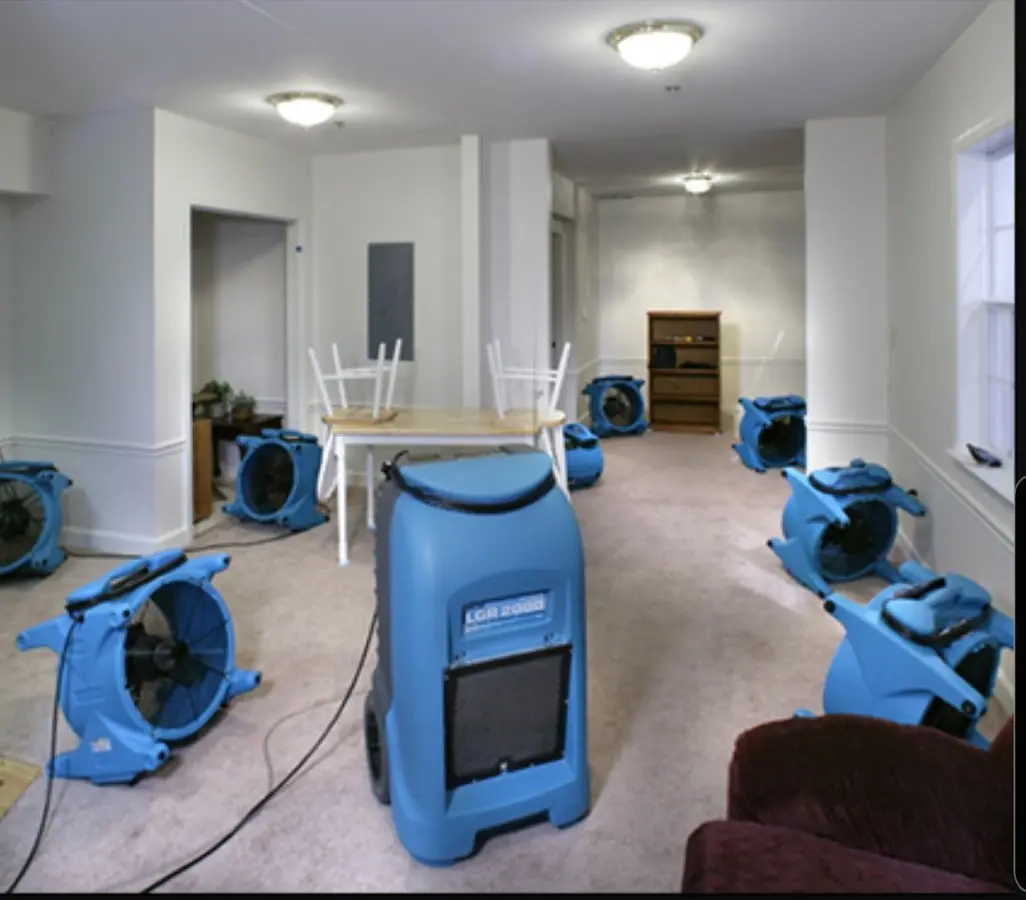 Air movers and dehumidifier setup for Water Extraction & Removal in Howard